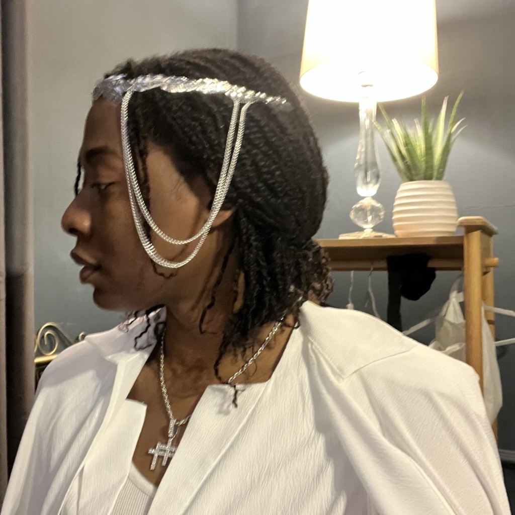 Twists styled with hair jewellery